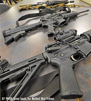 Assalt Rifles on Table - AP Photo