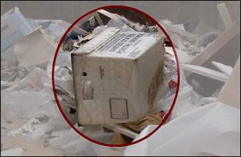 Dumpster with USPS basket and mail ballots