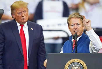 Rand Paul on stage with President Trump