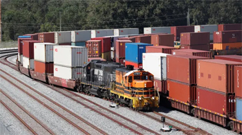 Railroad train moving containers