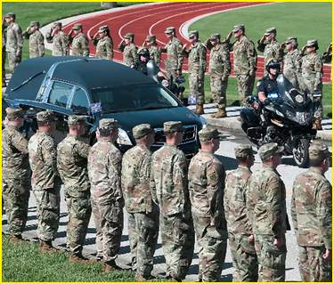 Troops showing respect for member of the Armed Services